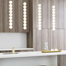 Load image into Gallery viewer, Orbet LED Pendant Light in kitchen.
