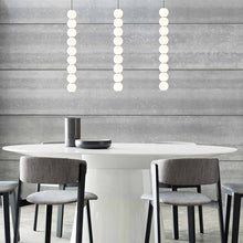 Load image into Gallery viewer, Orbet LED Pendant Light in dining room.
