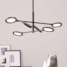 Load image into Gallery viewer, Spectica LED Chandelier in living room.
