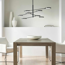 Load image into Gallery viewer, Spectica LED Chandelier in living room.
