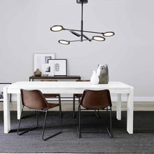 Load image into Gallery viewer, Spectica LED Chandelier in living room.
