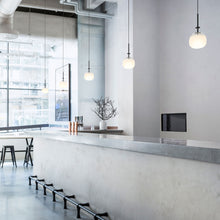 Load image into Gallery viewer, Tempo Oval LED Pendant Light in dining room.
