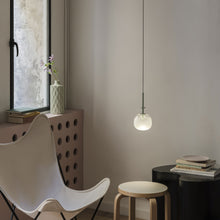 Load image into Gallery viewer, Tempo Oval LED Pendant Light in living room.
