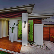 Load image into Gallery viewer, Trescott Outdoor Wall Light in Outdoor Area.
