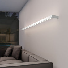 Load image into Gallery viewer, Thin-Line™ LED Wall Light in living room.

