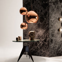Load image into Gallery viewer, Copper Round LED Pendant Light in exhibition.
