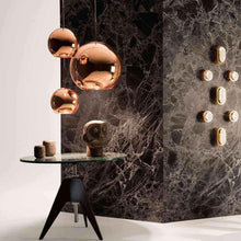 Load image into Gallery viewer, Copper Trio Round LED Pendant Light in exhibition.
