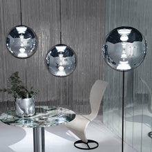 Load image into Gallery viewer, Globe LED Floor Lamp in exhibition.
