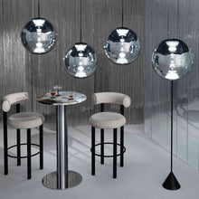 Load image into Gallery viewer, Globe LED Pendant Light in exhibition.
