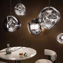 Load image into Gallery viewer, Melt Trio Round LED Pendant Light in exhibition.

