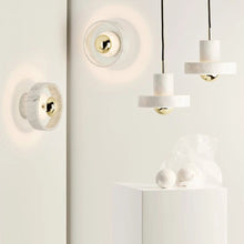 Load image into Gallery viewer, Stone LED Wall Light in exhibition.
