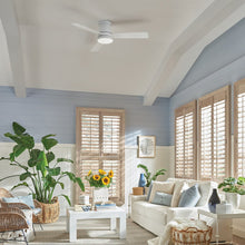 Load image into Gallery viewer, Trey LED Ceiling Fan in living room.
