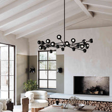 Load image into Gallery viewer, Colt Chandelier in living room.
