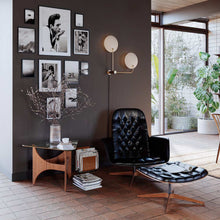 Load image into Gallery viewer, Leif Plug-In Wall Light in living room.
