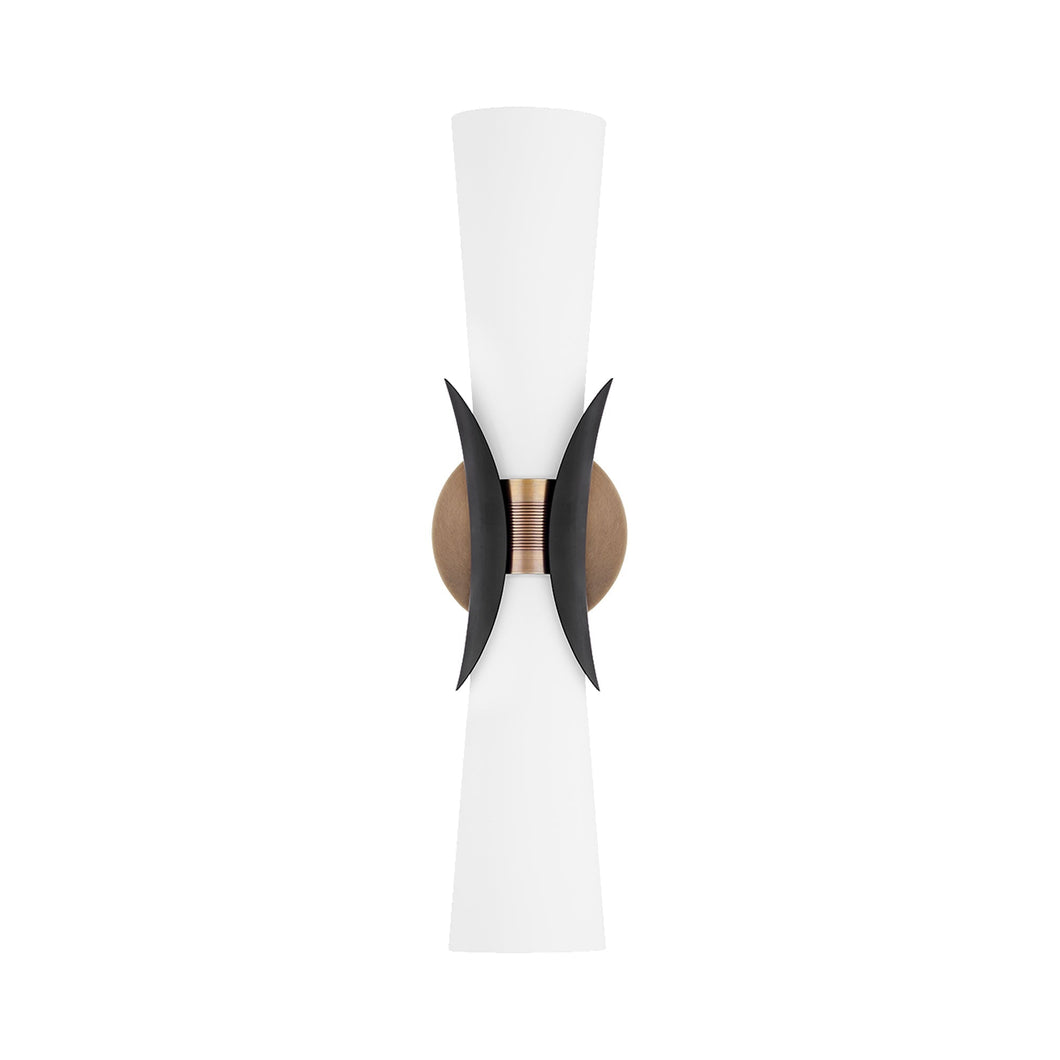 Muncie Wall Light in Patina Brass.