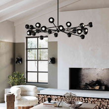 Load image into Gallery viewer, Pomona Wall Light in living room.
