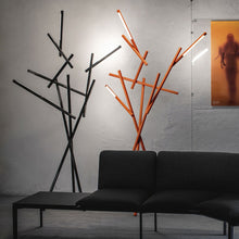 Load image into Gallery viewer, Tuareg LED Floor Lamp in living room.
