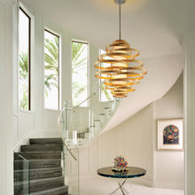 Load image into Gallery viewer, Vertigo Pendant Light in living room.

