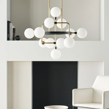 Load image into Gallery viewer, Viaggio Chandelier in living room.
