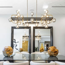 Load image into Gallery viewer, Viaggio Linear Pendant Light in dining room.

