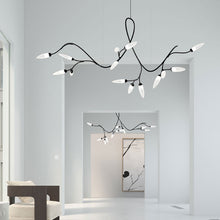 Load image into Gallery viewer, Vines™ LED Pendant Light in living room.
