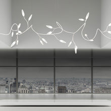 Load image into Gallery viewer, Vines™ LED Pendant Light in living room.
