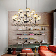 Load image into Gallery viewer, Puppet Chandelier in living room.
