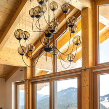 Load image into Gallery viewer, Puppet Chandelier in living room.
