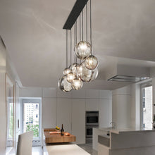 Load image into Gallery viewer, Puppet Linear Pendant Light in dining room.
