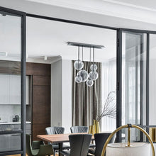 Load image into Gallery viewer, Puppet Linear Pendant Light in dining room.
