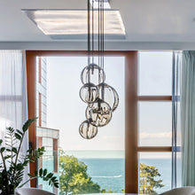Load image into Gallery viewer, Puppet Linear Pendant Light in dining room.

