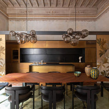 Load image into Gallery viewer, Puppet Ring Pendant Light in dining room.
