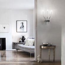 Load image into Gallery viewer, Stardust Wall Light in living room.
