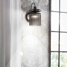 Load image into Gallery viewer, Tread Wall Light in living room.
