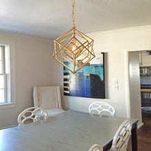 Load image into Gallery viewer, Cubist Chandelier in dining room.
