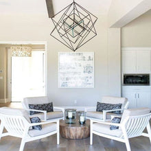 Load image into Gallery viewer, Cubist Chandelier in living room.
