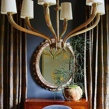 Load image into Gallery viewer, Ruhlmann Chandelier in living room.
