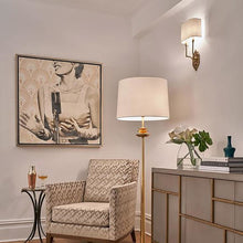 Load image into Gallery viewer, Silhouette Fretwork Wall Light in living room.
