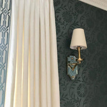 Load image into Gallery viewer, Verona Mirrored Wall Light in living room.
