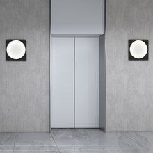 Load image into Gallery viewer, Vuoto™ LED Wall Light in room.
