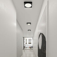 Load image into Gallery viewer, Vuoto™ LED Wall Light in living room.
