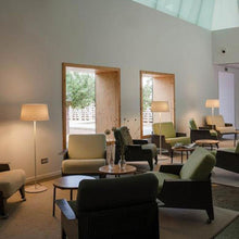 Load image into Gallery viewer, Warm LED Floor Lamp in restaurant.
