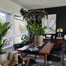 Load image into Gallery viewer, Whit Chandelier in living room.
